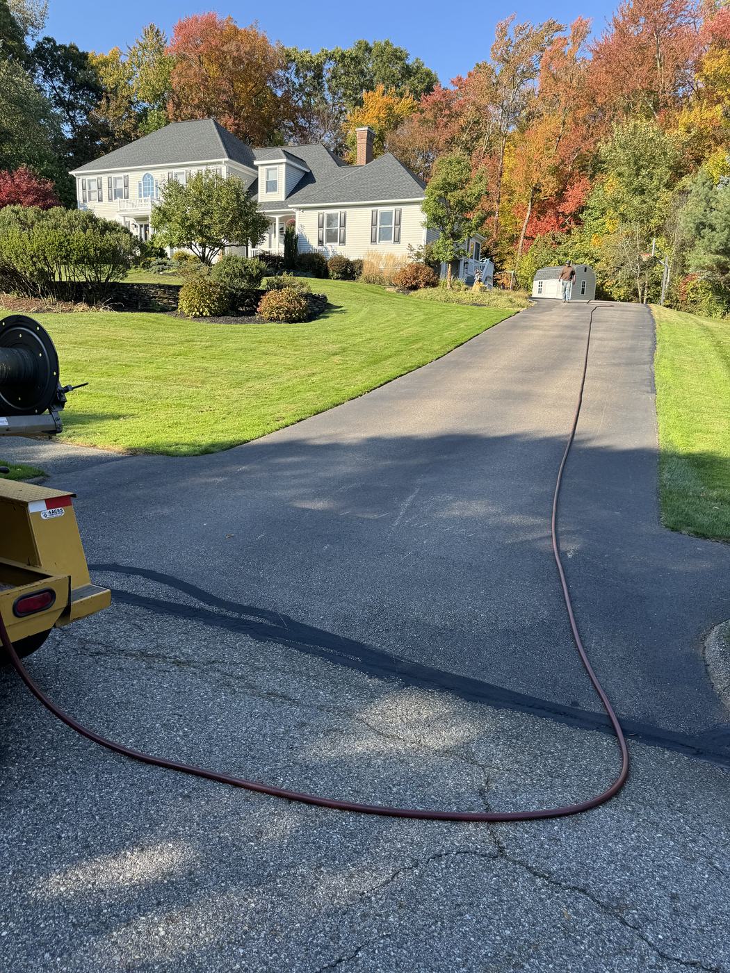 Residential sealcoating job with clean finished edges